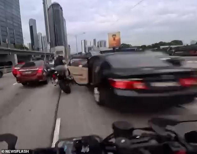 Dashcam Footage Shows Toddler's Door Pull Leading to Motorcycle Crash in Malaysia