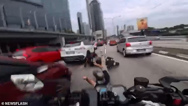 Dashcam Footage Shows Toddler's Door Pull Leading to Motorcycle Crash in Malaysia