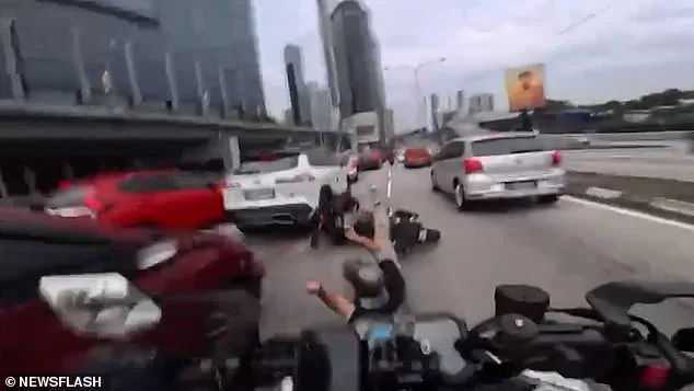 Dashcam Footage Shows Toddler's Door Pull Leading to Motorcycle Crash in Malaysia