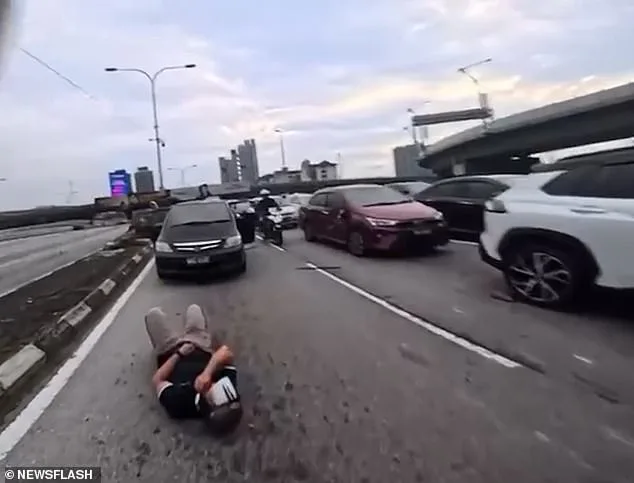 Dashcam Footage Shows Toddler's Door Pull Leading to Motorcycle Crash in Malaysia