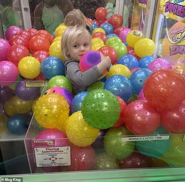 Two-Year-Old's Unlikely Claw Machine Adventure Sparks Laughter and Concern Across the Internet