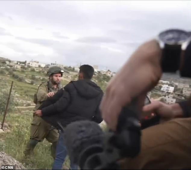 Israeli Soldiers Choke CNN Photojournalist During West Bank Detention