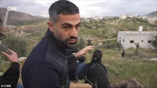 Israeli Soldiers Choke CNN Photojournalist During West Bank Detention
