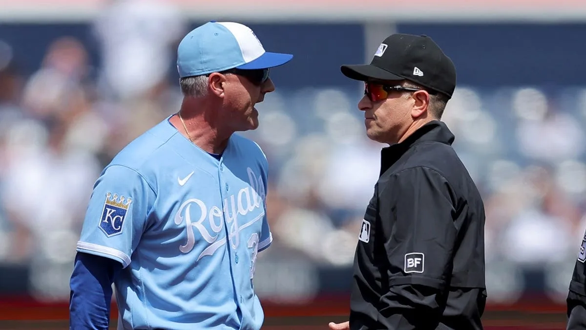 Royals manager ejected in first inning over balk dispute with no outs.