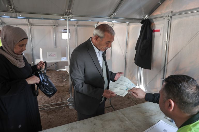Gaza residents vote in first municipal election since 2006 amid war destruction.