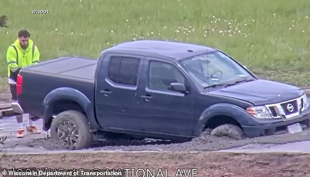 Wisconsin Driver Ignored Road Closure, Stuck Truck in Wet Concrete