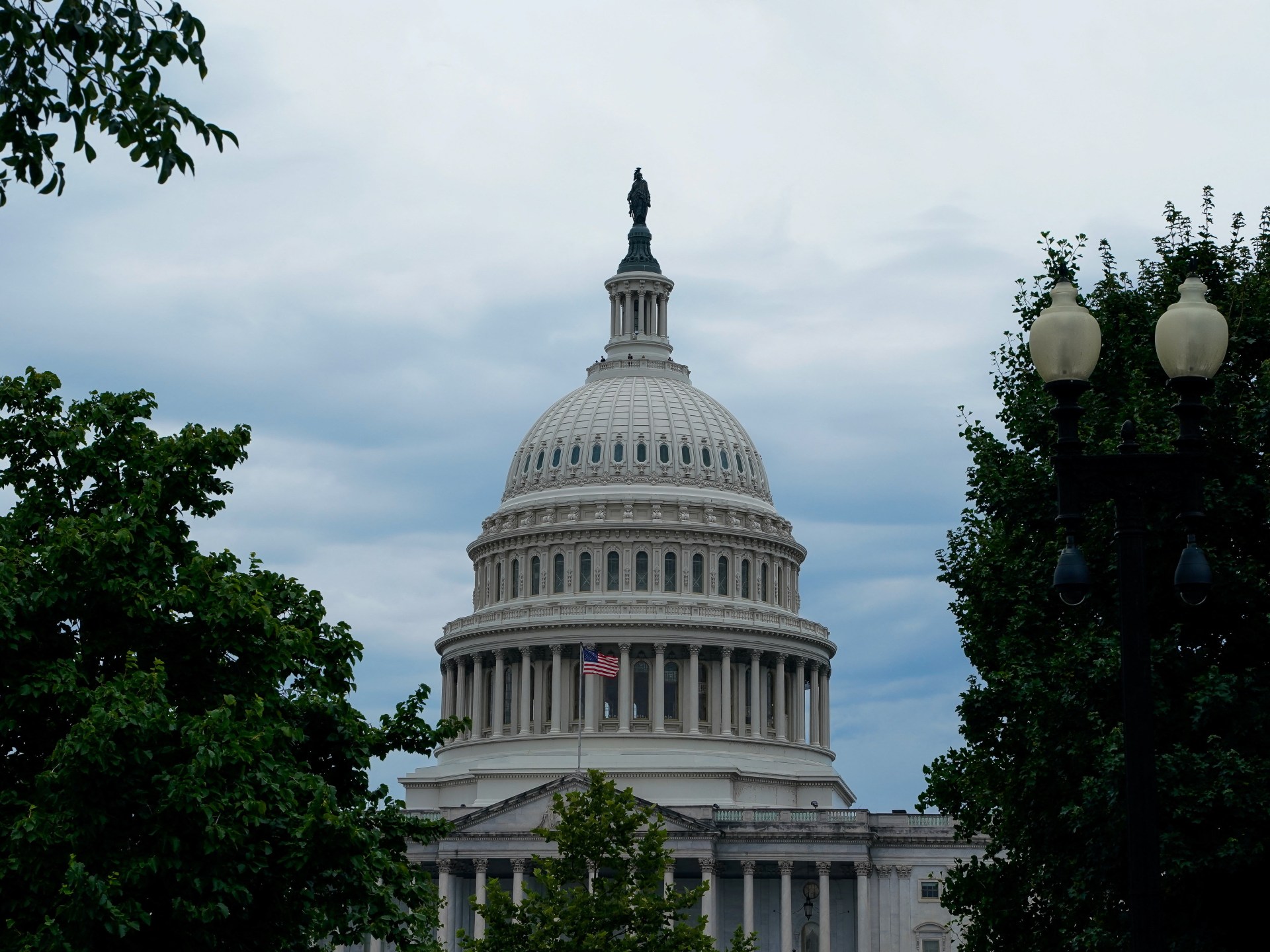 Lawmakers urge Trump to submit new Iran deal to Congress under 2015 law.